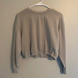 A light green crop top